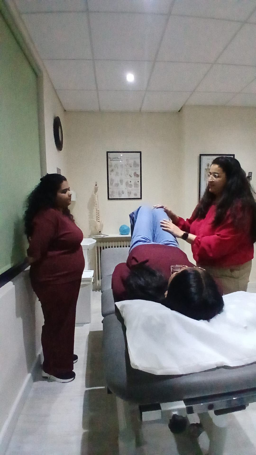 Swan Care staff supporting a service user during a therapy session