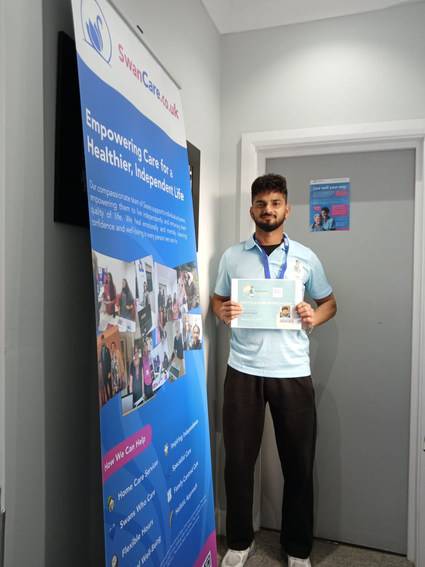 Swan Care carer receiving a Certificate of Appreciation award